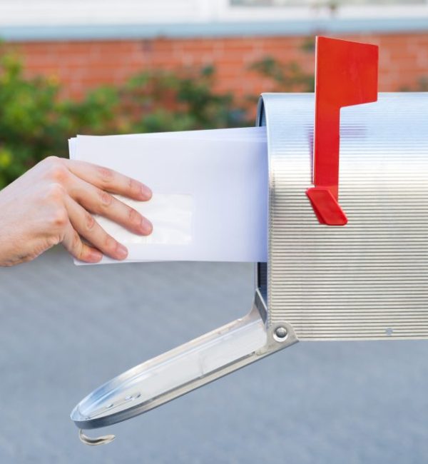 Close-up,Of,Person,Removing,Yellow,Letters,From,Mailbox